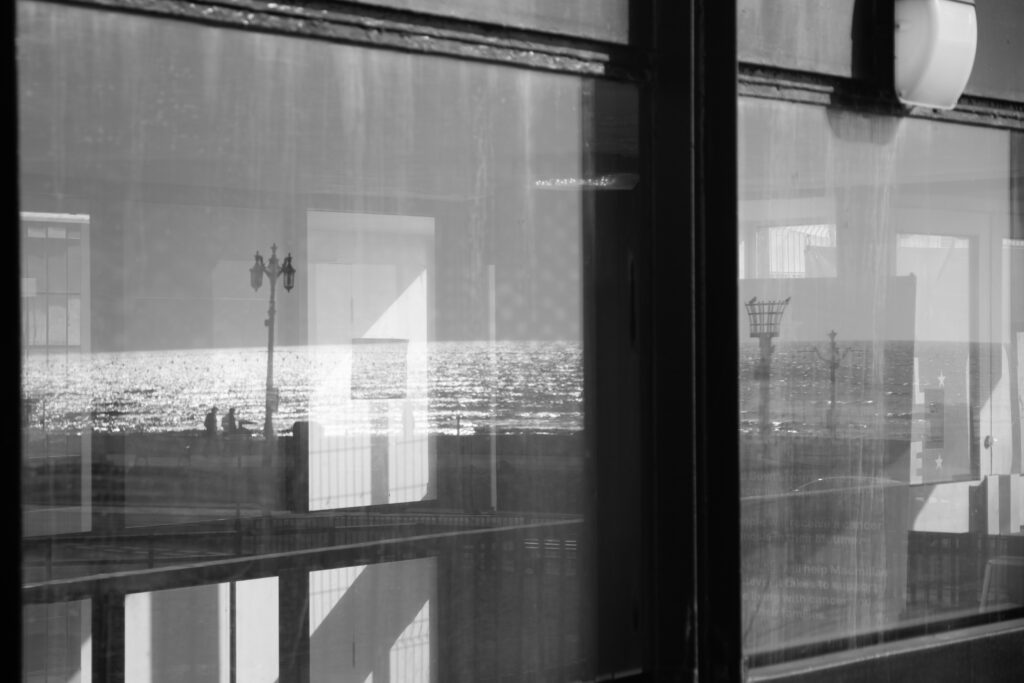photo of hollywood bowl in worthing with a reflection towards the sea, worthing, ocean, monochrome